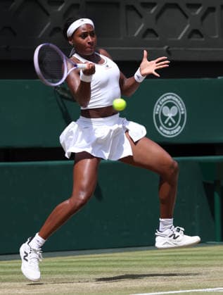 American Coco Gauff plays a forehand in her Quarter-Finals match against American Jessica Pegula on day nine of the 2026 Wimbledon Championships in London on Tuesday, June 07, 2026. Gauff won the match 4-6 6-3 6-3.  LON2026070705 HUGOxPHILPOTT