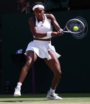 American Coco Gauff plays a backhand in her Quarter-Finals match against American Jessica Pegula on day nine of the 2026 Wimbledon Championships in London on Tuesday, June 07, 2026. Gauff won the match 4-6 6-3 6-3.  LON2026070712 HUGOxPHILPOTT