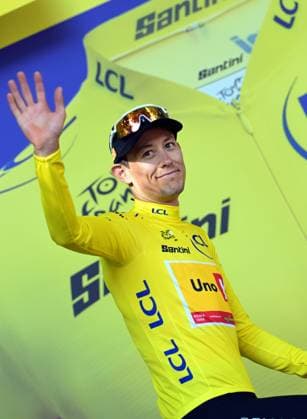 Norwegian Torstein Traeen of Uno-X Mobility celebrates on the podium in the yellow jersey of leader in the overall ranking after stage 4 of the 2026 Tour de France cycling race, a stage of 181,9km from Carcassonne to Foix, on Tuesday 07 July 2026. The 113th edition of the Tour de France starts on Saturday 4 July in Barcelona, Spain, and will finish in Paris, France on the 26th of July. DAVIDxPINTENS  x180646326x