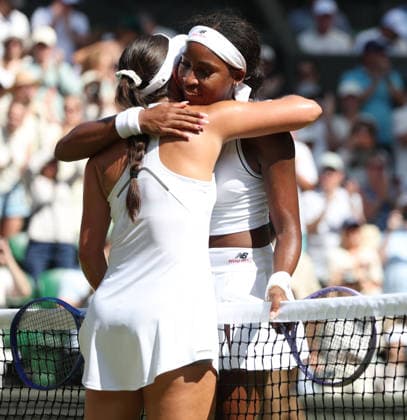 American Coco Gauff consoles her opponent in her Quarter-Finals match against American Jessica Pegula on day nine of the 2026 Wimbledon Championships in London on Tuesday, July 07, 2026. Gauff won the match 4-6 6-3 6-3.  LON2026070735 HUGOxPHILPOTT