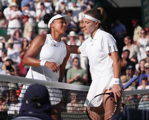 Tennis - 2026 Wimbledon Championships - Day Eight (Week Two) - All England Lawn Tennis & Croquet Club, London - Tuesday 7th July 2026 Court One: Womens Singles : Naomi Osaka (JPN) v Karolina Muchova (CZE) Karolina Muchova (CZE) after winning for the match with Osaka at the net COLORSPORT ANDREW COWIE 