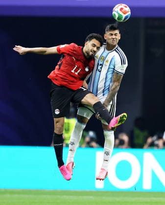 FIFA World Cup, WM, Weltmeisterschaft, Fussball 2026 - Round of 16 - Argentina vs Egypt Mostafa Ziko of Egypt (L) and Cristian Romero of Argentina in action during the FIFA World Cup 2026 Round of 16 match Argentina against Egypt, in Atlanta, USA, 07 July 2026. ATLANTA United States  Copyright: xCRISTOBALxHERRERA-ULASHKEVICHx