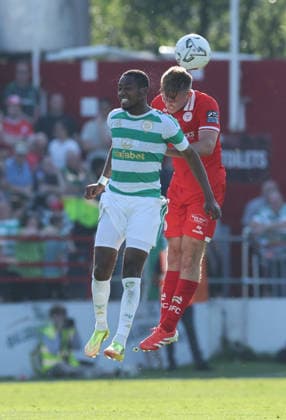 Michel-Ange Balikwisha of Celtic and Odhran Casey of Shelbourne Shelbourne FC v Celtic , Preseason Friendly, Football, Tolka Park, Dublin, Ireland - 07 Jul 2026Dublin Tolka Park Ireland  Copyright: xLorrainexO Sullivan Shutterstockx 16980106v