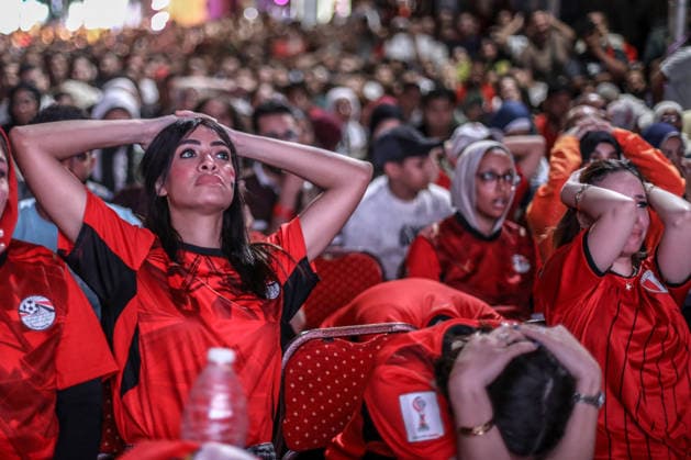 Egyptian football fans watch FIFA World Cup, WM, Weltmeisterschaft, Fussball in Cairo CAIRO, EGYPT - JULY 7: Egyptian football fans react with sadness after their national team, Nationalteam lost the 2026 FIFA World Cup Round of 16 match against Argentina while watching the game on public screens in Cairo, Egypt, on July 7, 2026. Mohamed Elshahed Anadolu Cairo Egypt. Editorial use only. Please get in touch for any other usage.  Copyright: x2026xAnadoluxMohamedxElshahedx