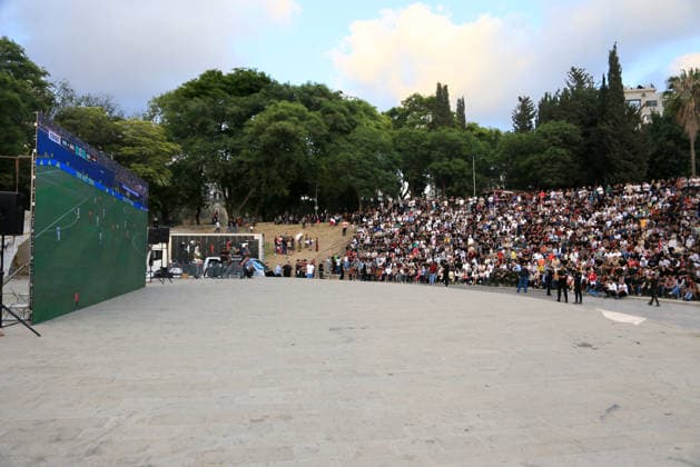 July 7, 2026, Nablus, Palestine: Palestinians watch the World Cup match between Egypt and Argentina at Jamal Abdel Nasser Stadium. Palestinian fans seen at Jamal Abdel Nasser Stadium, watching the match via live World Cup broadcast big screen tv. Final scores; Argentina 3 : 2 Egypt. Egypt Vs Argentina In Nablus, Palestine - 07 Jul 2026  - ZUMAs197 20260707_aaa_s197_062 Copyright: xNasserxIshtayehx