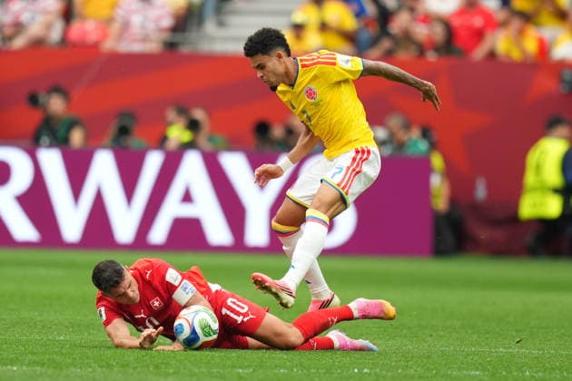 Switzerland v Colombia - FIFA World Cup, WM, Weltmeisterschaft, Fussball 2026 - Round of 16 VANCOUVER, CANADA - JULY 07: Luis Diaz (7) of Colombia in action against Granit Xhaka (10) of Switzerland during the 2026 FIFA World Cup Round of 16 match between Switzerland and Colombia at BC Place in Vancouver, British Columbia, Canada, on July 07, 2026 Ercin Erturk Anadolu British Columbia Canada. Editorial use only. Please get in touch for any other usage.  Copyright: x2026xAnadoluxErcinxErturkx