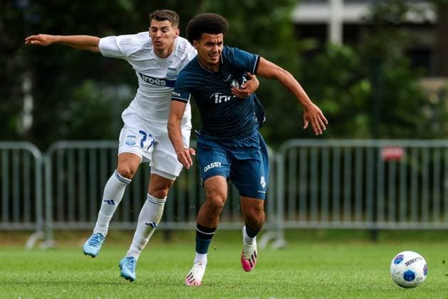 HAAKSBERGEN , 07-07-2026 , Ontmoetingspark De Greune , season 2026 2027 , Dutch pre-season football , friendly match between FC Utrecht and Apollon FC , picture shows Apollon FC player Ivan Ljubic and FC Utrecht player Rafik El Arguioui battle for possession Utrecht - Apollon  x204915588x Copyright:
