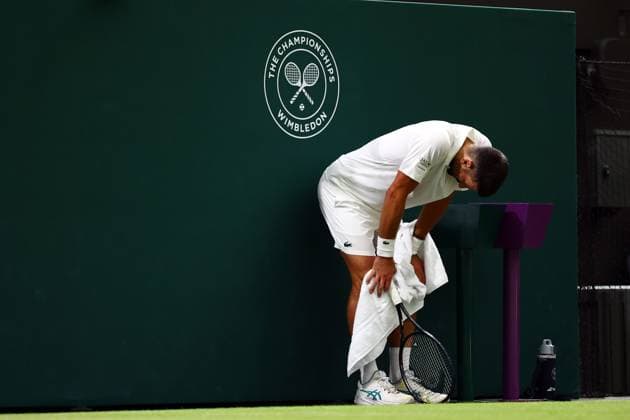 Novak Djokovic tired during his quarter-final match Wimbledon Tennis Championships, Day 9, The All England Lawn Tennis and Croquet Club, London, UK - 07 Jul 2026London The All England Lawn Tennis and United Kingdom  Copyright: xJamesxMarsh Shutterstockx 16978027ge