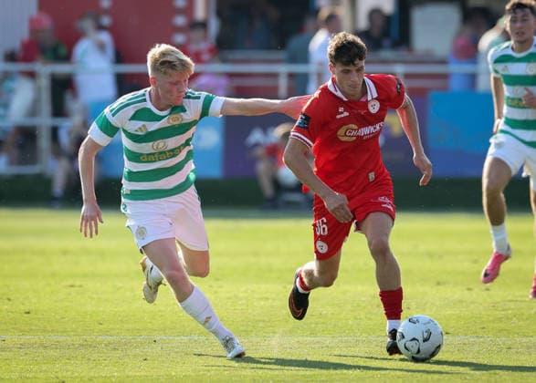 Sean McArdle of Celtic and Will Jarvis of Shelbourne Shelbourne FC v Celtic , Preseason Friendly, Football, Tolka Park, Dublin, Ireland - 07 Jul 2026Dublin Tolka Park Ireland  Copyright: xLorrainexO Sullivan Shutterstockx 16980106av