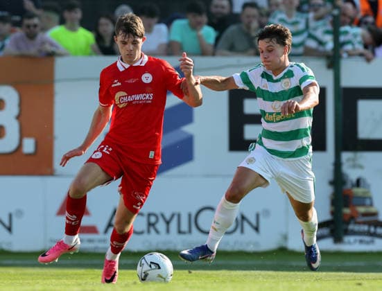 Joe Haney of Celtic and Sean Moore of Shelbourne Shelbourne FC v Celtic , Preseason Friendly, Football, Tolka Park, Dublin, Ireland - 07 Jul 2026Dublin Tolka Park Ireland  Copyright: xLorrainexO Sullivan Shutterstockx 16980106au