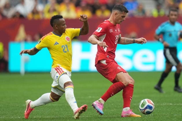 FIFA World Cup, WM, Weltmeisterschaft, Fussball 2026 - Round of 16 - Switzerland vs Colombia Jaminton Campaz of Colombia (L) in action against Granit Xhaka of Switzerland (R) during the FIFA World Cup 2026 Round of 16 match Switzerland against Colombia, in Vancouver, Canada, 07 July 2026. VANCOUVER Canada  Copyright: xBOBxFRIDx