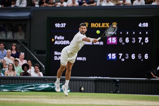 July 8, 2026, London, London, Great Britain: Novak Djokovic of Serbia returns with backhand during The Championships Wimbledon , 7.7.2026 in London (All England Lawn Tennis and Croquet Club), Great Britain Tennis 2026: Grand Slam: The Championships Wimbledon: 9th Day: Quarterfinal: DJOKOVIC 7:6 3:6 6:3 6:7 7:6 AUGER-ALLIASSIME  - ZUMAs343 20260708_zsp_s343_005 Copyright: xMathiasxSchulzx
