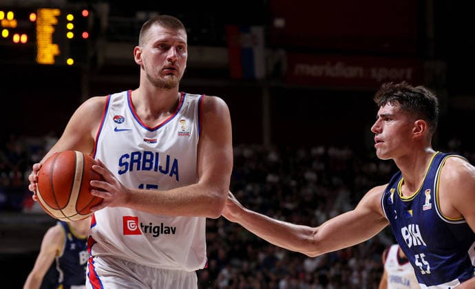 260707 -- BELGRADE, July 7, 2026 -- Serbia s Nikola Jokic L vies with Bosnia and Herzegovina s Luka Garza during a first round group C match between Serbia and Bosnia and Herzegovina at the FIBA basketball World Cup 2027 European qualifiers in Belgrade, Serbia on July 6, 2026. Photo by Xinhua SPSERBIA-BELGRADE-BASKETBALL-FIBA-WORLD CUP-QUALIFIER-SERBIA-BOSNIA AND HERZEGOVINA PredragxMilosavljevic  (SP)SERBIA-BELGRADE-BASKETBALL-FIBA-WORLD CUP-QUALIFIER-SERBIA-BOSNIA AND HERZEGOVINA IMAGO PredragxMilosavljevic  imago images 0860967419