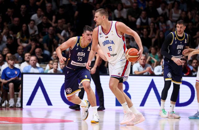 260707 -- BELGRADE, July 7, 2026 -- Serbia s Nikola Jokic R vies with Bosnia and Herzegovina s Luka Garza during a first round group C match between Serbia and Bosnia and Herzegovina at the FIBA basketball World Cup 2027 European qualifiers in Belgrade, Serbia on July 6, 2026. Photo by Xinhua SPSERBIA-BELGRADE-BASKETBALL-FIBA-WORLD CUP-QUALIFIER-SERBIA-BOSNIA AND HERZEGOVINA PredragxMilosavljevic  (SP)SERBIA-BELGRADE-BASKETBALL-FIBA-WORLD CUP-QUALIFIER-SERBIA-BOSNIA AND HERZEGOVINA IMAGO PredragxMilosavljevic  imago images 0860967429