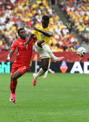 (260708) -- VANCOUVER, July 8, 2026 -- Davinson Sanchez (R) of Colombia vies with Breel Embolo of Switzerland during the round of 16 match between Switzerland and Colombia at the 2026 FIFA World Cup, WM, Weltmeisterschaft, Fussball at BC Place Vancouver in Vancouver, Canada, on July 7, 2026. (Photo by Xinhua) (SP)CANADA-VANCOUVER-FOOTBALL-FIFA WORLD CUP-ROUND OF 16-SUI VS COL ZouxZheng 