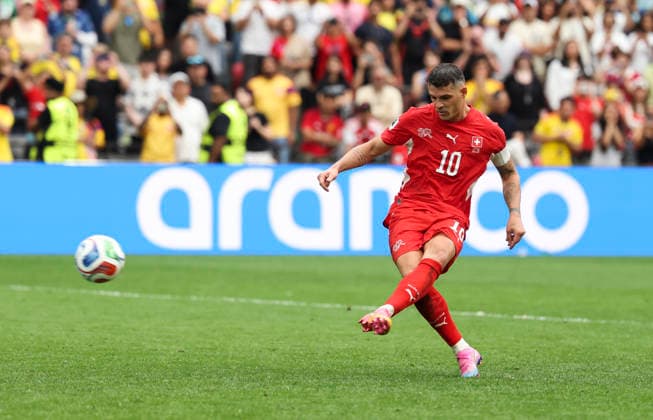 (260708) -- VANCOUVER, July 8, 2026 -- Granit Xhaka of Switzerland makes a shot during the penalty shootout of the round of 16 match between Switzerland and Colombia at the 2026 FIFA World Cup, WM, Weltmeisterschaft, Fussball at BC Place Vancouver in Vancouver, Canada, on July 7, 2026. (Photo by Xinhua) (SP)CANADA-VANCOUVER-FOOTBALL-FIFA WORLD CUP-ROUND OF 16-SUI VS COL ZouxZheng 