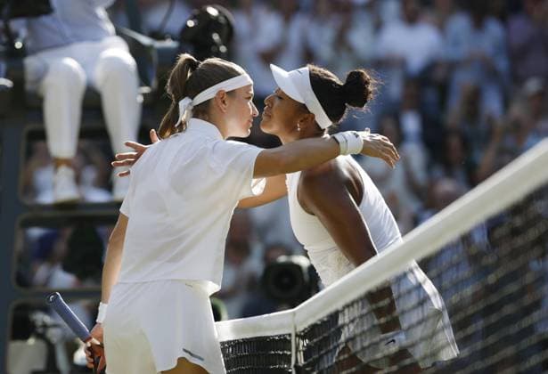 Tennis: Wimbledon championships Naomi Osaka (R) of Japan and Karolina Muchova of the Czech Republic hug each other after their match in the women s singles quarterfinals at the Wimbledon tennis tournament in London on July 7, 2026.  A14AA0005622074P