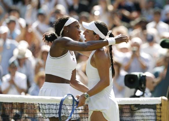 Tennis: Wimbledon championships Coco Gauff (L) of the United States embraces her compatriot Jessica Pegula after winning their women s singles quarterfinal match at the Wimbledon tennis tournament in London on July 7, 2026.  A14AA0005622087P