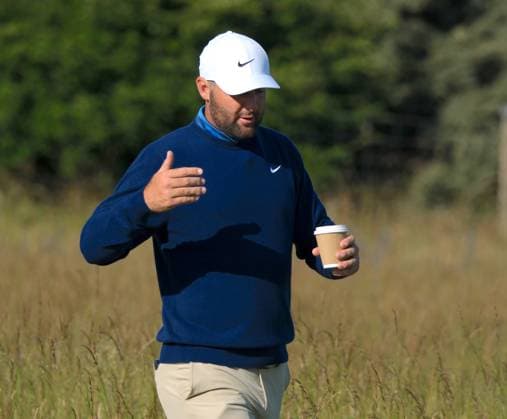 UK: The Genesis Scottish Open at The Renaissance Club, North Berwick, Scotland on 08 July 2026: Pictured: Scottie Scheffler (USA) has a coffee on the 1st fairway during the pro-am at the Genesis Scottish Open Championship 2026 North Berwick The Renaissance Club Scotland Scotland Copyright: xAlexxToddx