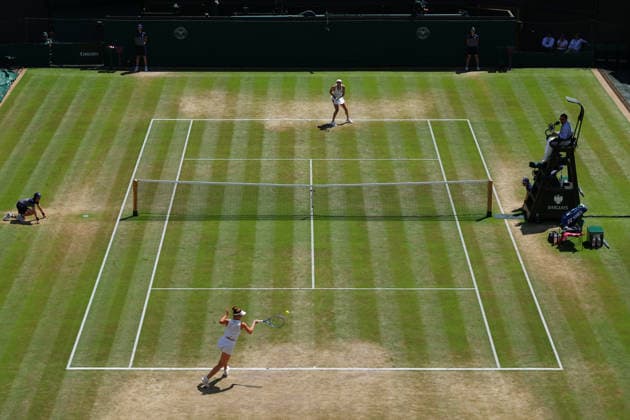 RECORD DATE NOT STATED 8th July 2026; All England Lawn Tennis and Croquet Club, London, England; Wimbledon Tennis Tournament, Day Ten; Linda Noskova (CZE) with a forehand shot to Elise Mertens (BEL) JohnxPatrickxFletcher