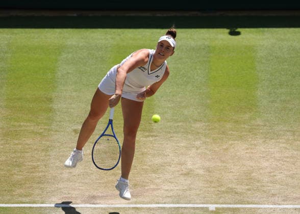 RECORD DATE NOT STATED 8th July 2026; All England Lawn Tennis and Croquet Club, London, England; Wimbledon Tennis Tournament, Day Ten; Linda Noskova (CZE) serves to Elise Mertens (BEL) JohnxPatrickxFletcher