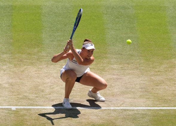 RECORD DATE NOT STATED 8th July 2026; All England Lawn Tennis and Croquet Club, London, England; Wimbledon Tennis Tournament, Day Ten; Linda Noskova (CZE) serves to Elise Mertens (BEL) JohnxPatrickxFletcher