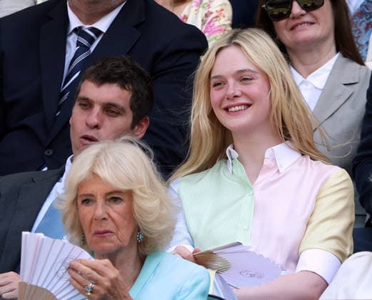 Her Royal Highness Queen Camilla (L) and American actress Elle Fanning watch the Women s Quarter-Finals on day Ten of the 2026 Wimbledon Championships in London on Wednesday, July 08,2026.  LON2026070837 HUGOxPHILPOTT