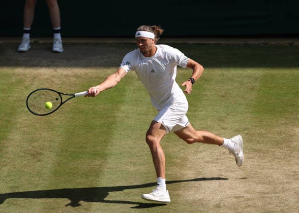 RECORD DATE NOT STATED 8th July 2026; All England Lawn Tennis and Croquet Club, London, England; Wimbledon Tennis Tournament, Day Ten; Alexander Zverev (GER) with a forehand shot to Taylor Fritz (USA) JohnxPatrickxFletcher