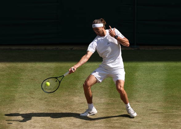 RECORD DATE NOT STATED 8th July 2026; All England Lawn Tennis and Croquet Club, London, England; Wimbledon Tennis Tournament, Day Ten; Alexander Zverev (GER) with a forehand shot to Taylor Fritz (USA) JohnxPatrickxFletcher