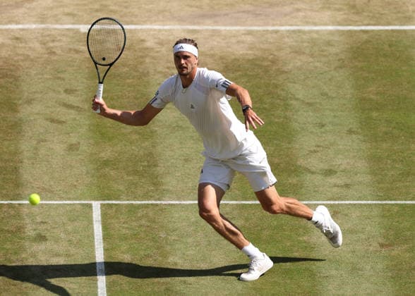 RECORD DATE NOT STATED 8th July 2026; All England Lawn Tennis and Croquet Club, London, England; Wimbledon Tennis Tournament, Day Ten; Alexander Zverev (GER) with a forehand shot to Taylor Fritz (USA) JohnxPatrickxFletcher