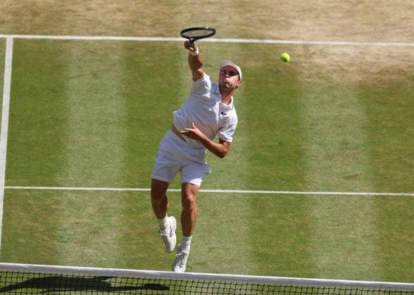RECORD DATE NOT STATED 8th July 2026; All England Lawn Tennis and Croquet Club, London, England; Wimbledon Tennis Tournament, Day Ten; Arthur Fery (GBR) plays a shot at the net against Flavio Cobolli (ITA) JohnxPatrickxFletcher