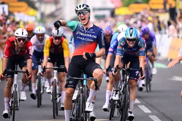 Tour de France 2026 Stage 5 PAU, FRANCE - JULY 08 : Kooij Olav (NED) of Decathlon CMA CGM Team wins, third place for Merlier Tim (BEL) of Soudal Quick-Step during stage 5 of the 113rd edition of Tour de France an UCI World Tour 2.UWT cycling road race stage for Men Elite of 158 km with start in Lannemezan and finish in Pau on July 8, 2026 in Pau, France, 08 07 2026 Pau France  Copyright: xTomasxSiskx