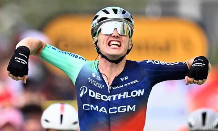 Dutch Olav Kooij of Decathlon CMA CGM Team celebrates as he crosses the finish line to win stage 5 of the 2026 Tour de France cycling race, a stage of 158km from Lannemezan to Pau, on Wednesday 08 July 2026. The 113th edition of the Tour de France starts on Saturday 4 July in Barcelona, Spain, and will finish in Paris, France on the 26th of July. JASPERxJACOBS  x180728547x