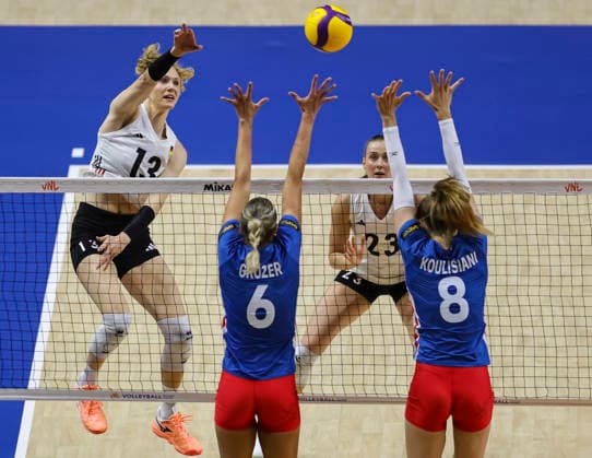 WomenÕs Volleyball Nations League - Belgrade 2026 Germany s Emilia Weske spikes the ball against Czech Republic s Helena Grozer and Czech Republic s Ela Koulisiani during the WomenÕs Volleyball Nations League Pool 7 match between France v Netherlands at Belgrade Arena on July 08, 2026 in Belgrade, Serbia. Belgrade Serbia Copyright: xSrdjanxStevanovicx x