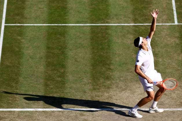 Taylor Fritz during his quarter final match. Wimbledon Tennis Championships, Day 10, The All England Lawn Tennis and Croquet Club, London, UK - 08 Jul 2026London The All England Lawn Tennis and United Kingdom  Copyright: xJamesxMarsh Shutterstockx 16978036gm