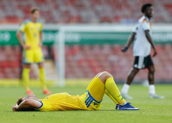 Wrexham, Wales, 8th July 2026. Kyrylo Dihtiar of Ukraine reacts at the full time result as Ukraine lose their Semi Final following the Ukraine U19 vs Germany U19 UEFA European U19 Championship match at The Racecourse, Wrexham. Picture credit should read: Cody Froggatt Sportimage EDITORIAL USE ONLY. No use with unauthorised audio, video, data, fixture lists, club league logos or live services. Online in-match use limited to 120 images, no video emulation. No use in betting, games or single club league player publications. SPI_047_CF_UKRAINE_U19_V_GERMANY_U19 SPI-4857-0046