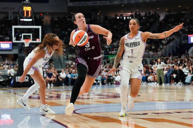 July 8, 2026, Toronto, On, CAN: Toronto Tempo Marina Mabrey (3) drives between Golden State Valkyries Veronica Burton (22) and Gabby Williams (1) during first half WNBA, Basketball Damen, USA basketball action in Toronto on Wednesday, July 8, 2026. Canada News - July 8, 2026  - ZUMAc35_ 20260708_zaf_c35_057 Copyright: xChrisxYoungx
