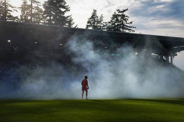 July 8, 2026, Burnaby, Bc, CANADA: Vancouver Whitecaps goalkeeper Isaac Boehmer calls out to his teammates as smoke from a smoke bomb set off by fans drifts across the field during the first half of a Canadian Championship quarterfinal soccer match against Cavalry FC, in Burnaby, B.C., on Wednesday, July 8, 2026. Canada News - July 8, 2026  - ZUMAc35_ 20260708_zaf_c35_080 Copyright: xDarrylxDyckx