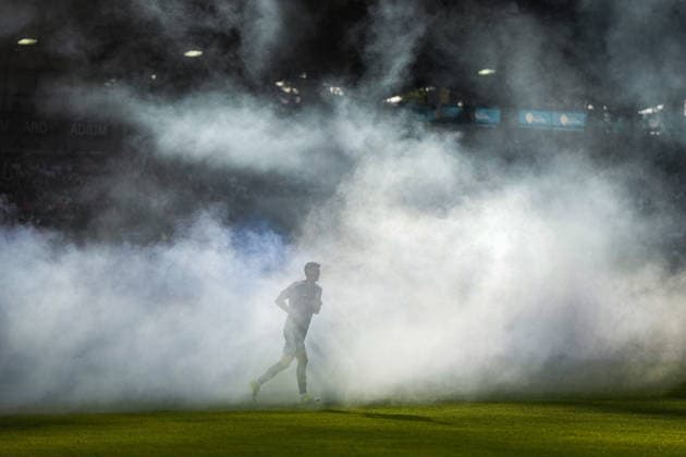 July 8, 2026, Burnaby, Bc, CANADA: Vancouver Whitecaps Ranko Veselinovic jogs through smoke from a smoke bomb set off by fans during the first half of a Canadian Championship quarterfinal soccer match against Cavalry FC, in Burnaby, B.C., on Wednesday, July 8, 2026. Canada News - July 8, 2026  - ZUMAc35_ 20260708_zaf_c35_081 Copyright: xDarrylxDyckx