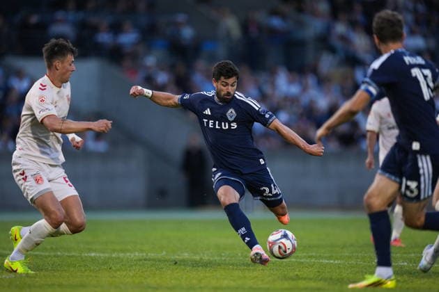 July 8, 2026, Burnaby, Bc, CANADA: Vancouver Whitecaps Brian White, centre, takes a shot on goal as Cavalry FC s Amer Didic, left, and Vancouver s Thomas Muller, front right, watch during the second half of a Canadian Championship quarterfinal soccer match, in Burnaby, B.C., on Wednesday, July 8, 2026. Canada News - July 8, 2026  - ZUMAc35_ 20260708_zaf_c35_089 Copyright: xDarrylxDyckx