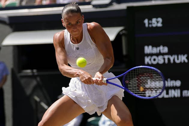 (260709) -- LONDON, July 9, 2026 -- Marta Kostyuk of Ukraine returns the ball during the women s singles quarterfinal match against Jasmine Paolini of Itlay at the Wimbledon Tennis Championships in London, Britain, on July 8, 2026. (Photo by Xinhua) (SP)BRITAIN-LONDON-TENNIS-WIMBLEDON-WOMEN S SINGLES DinendraxHaria 