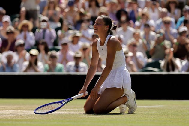 (260709) -- LONDON, July 9, 2026 -- Marta Kostyuk of Ukraine celebrates after winning the women s singles quarterfinal match against Jasmine Paolini of Itlay at the Wimbledon Tennis Championships in London, Britain, on July 8, 2026. (Photo by Xinhua) (SP)BRITAIN-LONDON-TENNIS-WIMBLEDON-WOMEN S SINGLES DinendraxHaria 