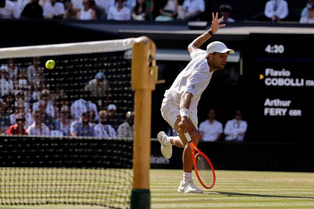 (260709) -- LONDON, July 9, 2026 -- Flavio Cobolli of Itlay returns the ball during the men s singles quarterfinal match against Arthur Fery of Britain at the Wimbledon Tennis Championships in London, Britain, on July 8, 2026. (Photo by Xinhua) (SP)BRITAIN-LONDON-TENNIS-WIMBLEDON-MEN S SINGLES DinendraxHaria 