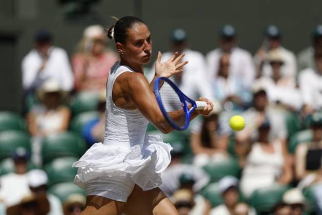 Tennis: Wimbledon championships Marta Kostyuk of Ukraine plays against Jasmine Paolini of Italy in the women s singles quarterfinals at the Wimbledon tennis tournament in London on July 8, 2026.  A14AA0005622254P