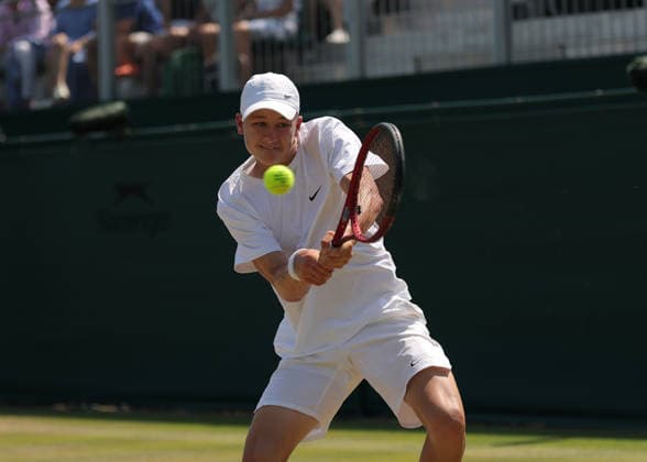 RECORD DATE NOT STATED 9th July 2026; All England Lawn Tennis and Croquet Club, London, England; Wimbledon Tennis Tournament, Day Eleven; Oliver Page (GBR) with a backhand shot to Thijs Boogaard (NED) JohnxPatrickxFletcher