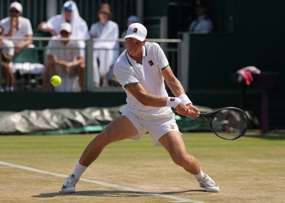 RECORD DATE NOT STATED 9th July 2026; All England Lawn Tennis and Croquet Club, London, England; Wimbledon Tennis Tournament, Day Eleven; Thijs Boogaard (NED) with a backhand shot to Oliver Page (GBR) JohnxPatrickxFletcher