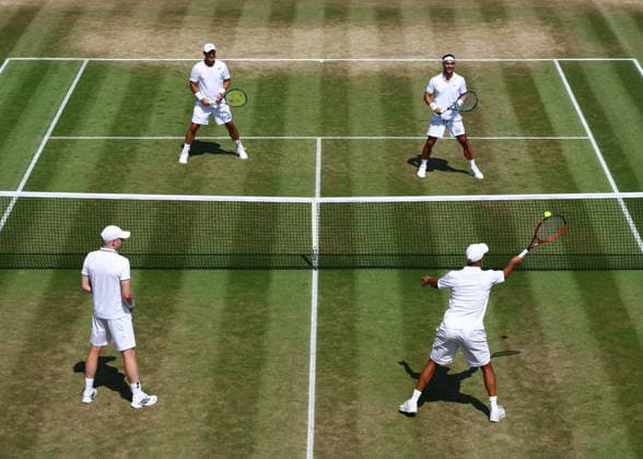 RECORD DATE NOT STATED 9th July 2026; All England Lawn Tennis and Croquet Club, London, England; Wimbledon Tennis Tournament, Day Eleven; Court 18 with the round robin doubles match between Fabio Fognini (ITA) and Lleyton Hewitt (AUS) vs James Blake (USA) and Kyle Edmund entertaining the crowd JohnxPatrickxFletcher