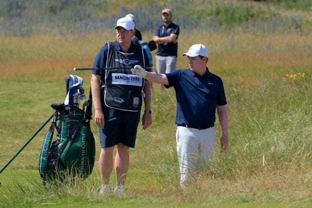 UK: The Genesis Scottish Open at The Renaissance Club, North Berwick, Scotland on 09 July 2026: Pictured: Robert MacIntyre (Scotland) with his caddie Michael Burrow on the 2nd fairway during the first round of the Genesis Scottish Open Championship 2026 North Berwick The Renaissance Club Scotland Scotland Copyright: xAlexxToddx