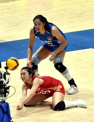 (260709) -- HONG KONG, July 9, 2026 -- Wang Mengjie (front) of China competes during the match between China and Ukraine at the Women s Volleyball Nations League (VNL) 2026 in Hong Kong, south China, July 9, 2026. ) (SP)CHINA-HONG KONG-VOLLEYBALL-NATIONS LEAGUE-WOMEN-CHN VS UKR (CN) LoxPingxFai 
