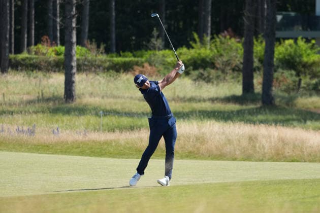 9th July 2026; The Renaissance Club, North Berwick, East Lothian, Scotland: Genesis Scottish Open Golf, Day One; Marco Penge hits his approach shot into the green on the 7th hole AlecxBrown